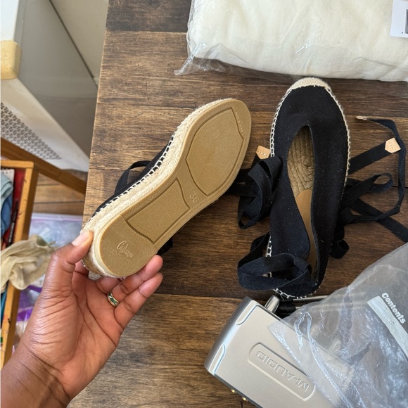 Castaner Shoes - A true size 38 so a little too snug. I wear a size 8 1/2. I’ve never worn them!